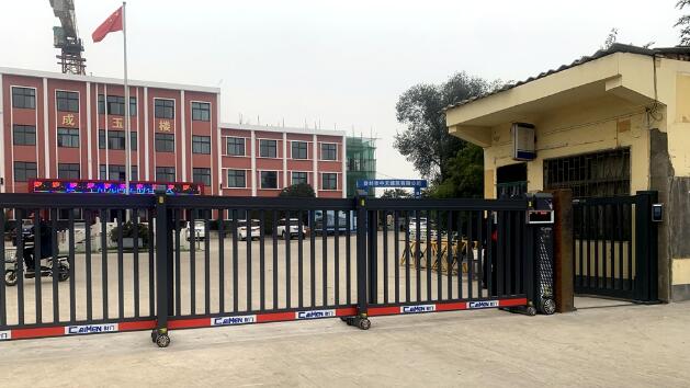 分段平移門-登封市石道鄉(xiāng)初級中學(xué) - 中出網(wǎng)-智能出入口與停車充電門戶