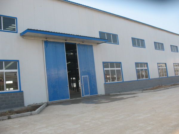 鎮(zhèn)平金冠工業(yè)門(mén)實(shí)例 - 中出網(wǎng)-智能出入口與停車(chē)充電門(mén)戶(hù)