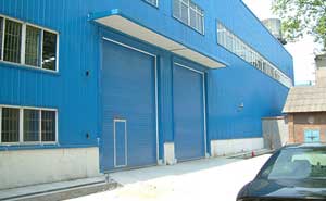 湘潭漣鋼工業(yè)提升門(mén)案例 - 中出網(wǎng)-智能出入口與停車(chē)充電門(mén)戶