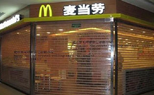 成都卷簾門工程案例：成都麥當(dāng)勞 - 中出網(wǎng)-智能出入口與停車充電門戶