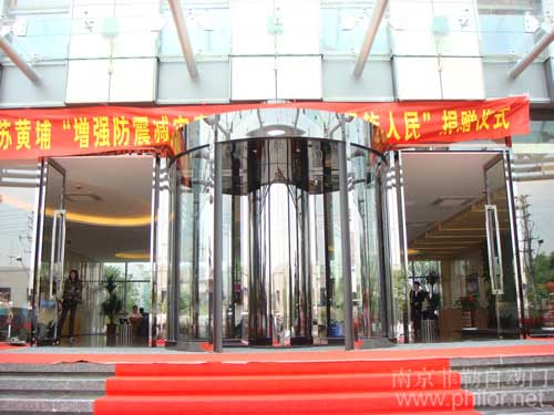 兩翼環(huán)柱自動旋轉門